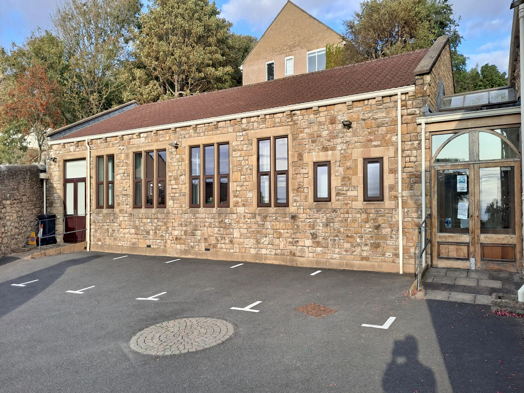 exterior view of St Mary's Hall, including car parking spaces
