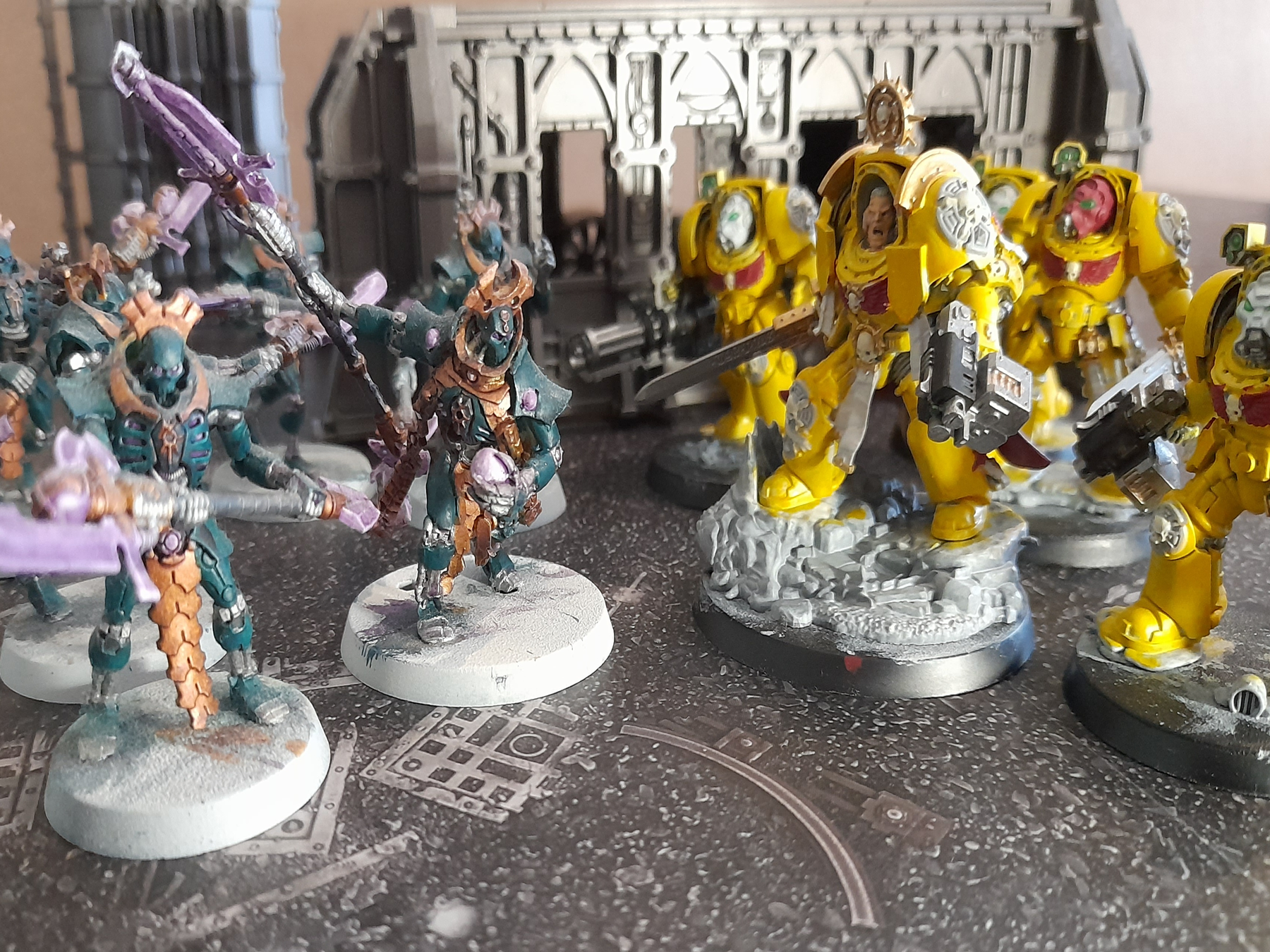 Imperial Fist Terminators facing off against Necron Lychguard from Warhammer 40,000